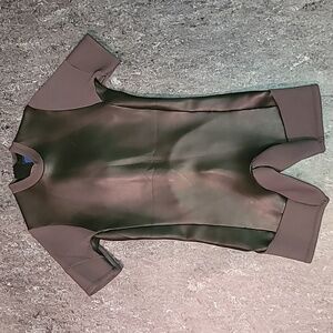 Vintage. Made in USA  RIP CURL. Short sleeve/legs wet suit.